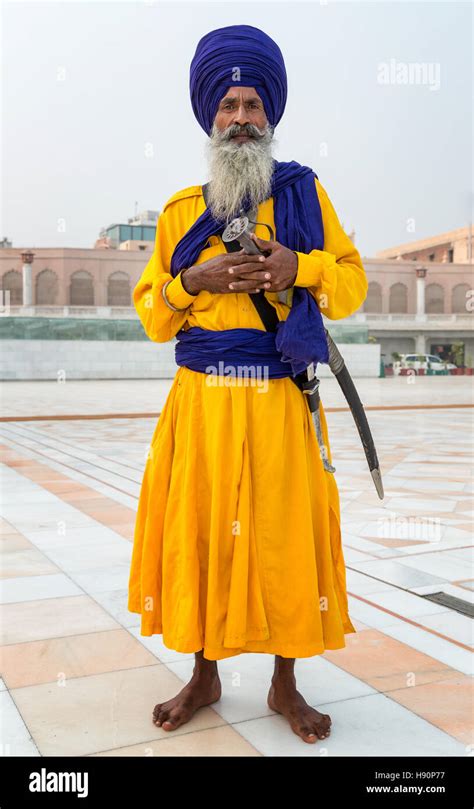 Sikh Guard At The Golden Temple Complex In The Sikh City Of Amritsar