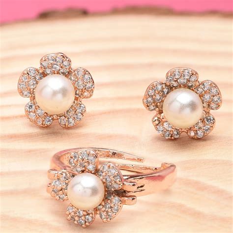 Buy Zaveri Pearls Rose Gold Cubic Zirconia Brass Stud Earrings Finger