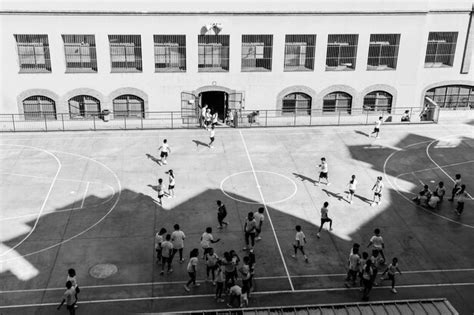 Premium Photo High Angle View Of People Playing Basketball Court