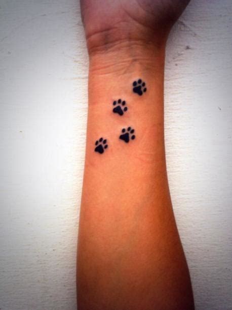 Cat Paw Prints on Wrist Tattoo Idea