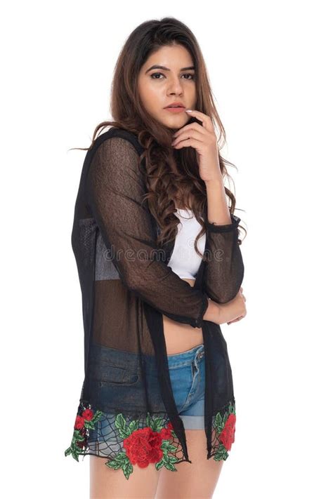 Indian You Girl With Camisole And Jeans Hot Pant With Elegant Pose And Expression Stock Image