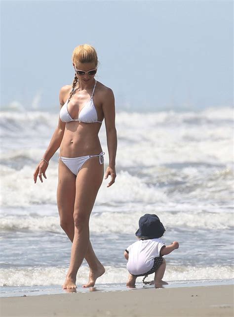 Michelle Hunziker In White Bikini On The Beach In Italy