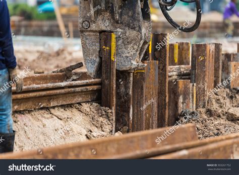 Retaining Wall Steel Sheet Pile Installation Stock Photo 303261752 ...