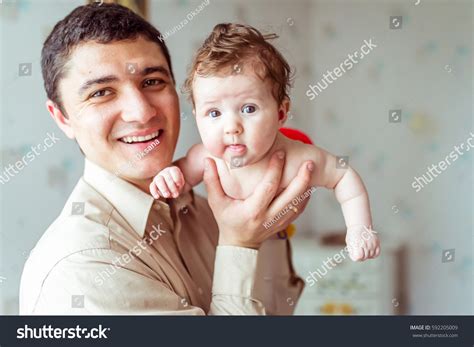 Father Holds On Hands Naked Baby Stock Photo Shutterstock