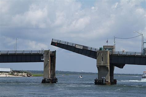 Driver Forced To Gun Engine And Jump Rising Drawbridge