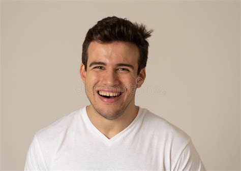 Portrait Of Attractive Cheerful Young Man With Smiling Happy Face