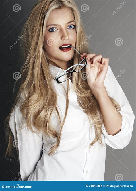 Pretty Blonde Girl With Glasses In Mouth Stock Photo Image Of Stylish
