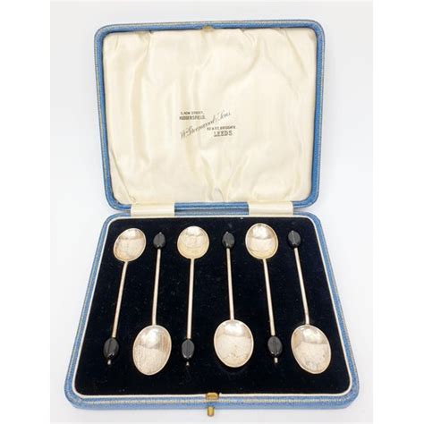 A Set Of Six Cased Hallmarked Silver Coffee Spoons With Coffee Bean