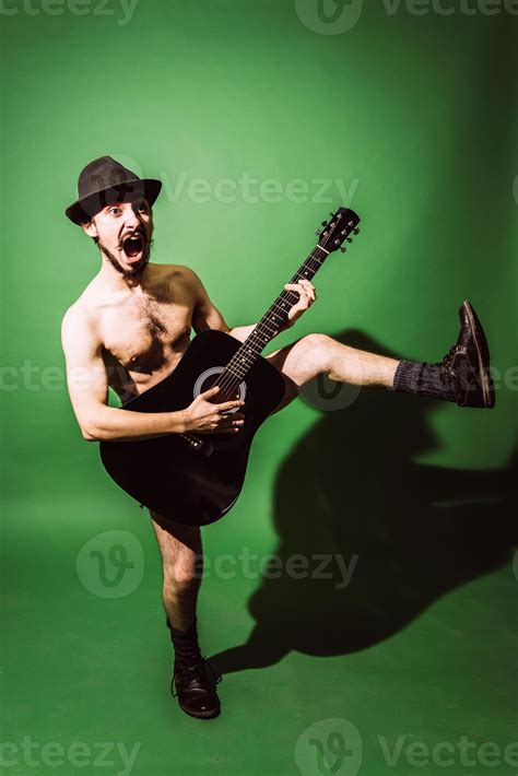 Naked Guy Playing Guitar In Studio Stock Photo At Vecteezy