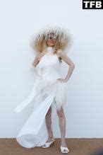 Pamela Anderson Sexy Flaunts Her Hot Boobs At The Le Raphia Jacquemus Show In Le Bourget AZNude