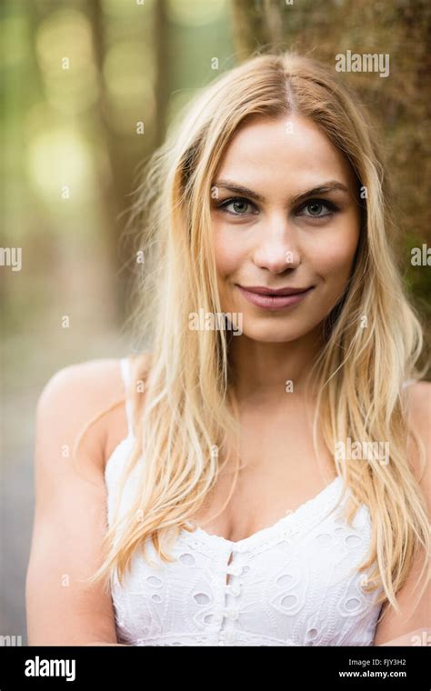 Close Up Of Beautiful Blonde Woman In The Woods Stock Photo Alamy