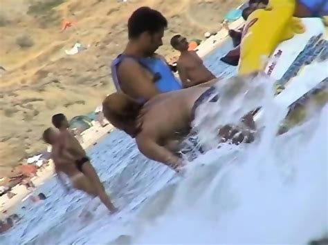Spycam On Beach Records Amateurs Topless And Also Nude