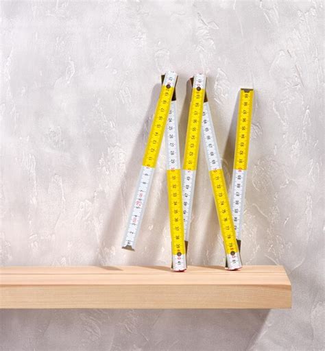 premium photo folding construction ruler   concrete gray