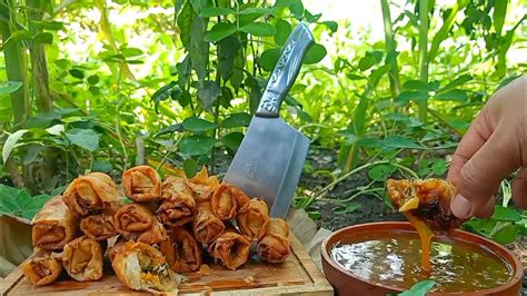 lumpia||traditional food of fried spring rolls and spicy chili sauce ...