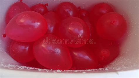 Red water balloons stock image. Image of open, throw - 100092971