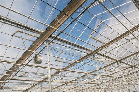 glass roof with fan in modern greenhouse 5143587 Stock Photo at Vecteezy