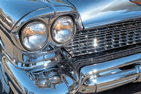 classic vintage car front  chrome detailing  shining headlights