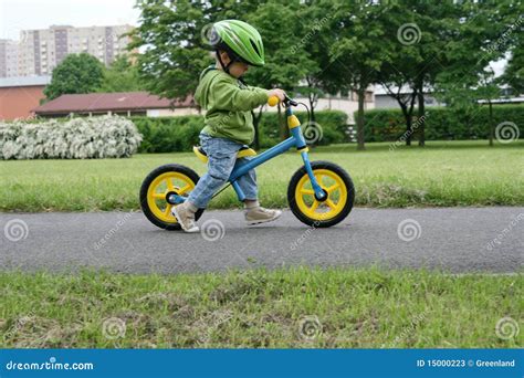 Learning To Ride On A First Bike Stock Image Image Of Happy Bike