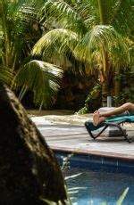 LINDSAY LOHAN In Bikini At A Beach In Mauritius HawtCelebs