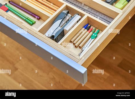 Table For Children With Multi Colored Facades Of Roll Out Drawers For