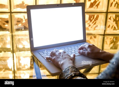Hands Typing A Letter In The Keyboard Of Stylish Laptop Computer With
