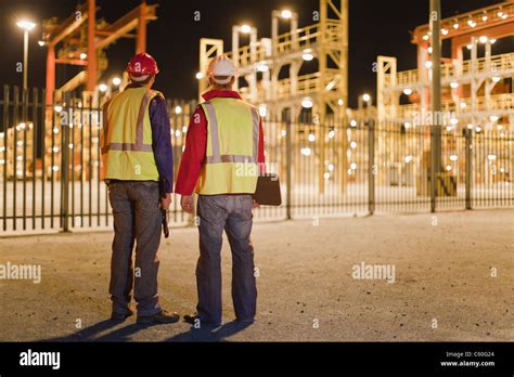 Workers Standing Together In Shipyard Stock Photo Alamy