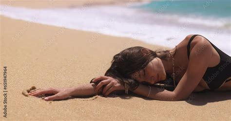 Summer Tropical Relaxation Of Fashionable Bikini Beach Model With Perfect Tanned Body In Black