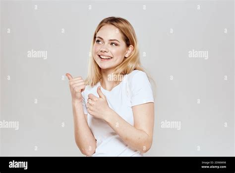 Cute Blonde White T Shirt Gesture With Hands Lifestyle Light Background Stock Photo Alamy