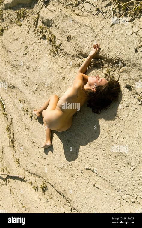 Naked Woman In The Desert Stock Photo Alamy