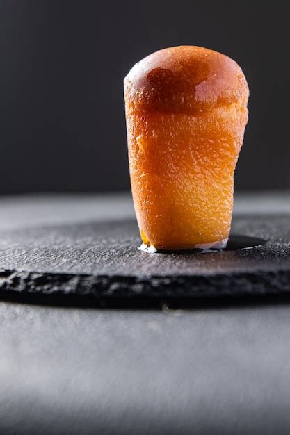 Premium Photo Baba Rum Sweet Alcohol Dessert Cake Meal Food Snack On
