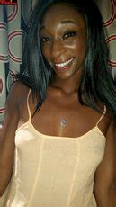 Amazing Black Babe Puts On Her New Dress And Poses Photos