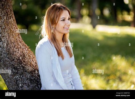 Beautiful Brunette In Nature Stock Photo Alamy