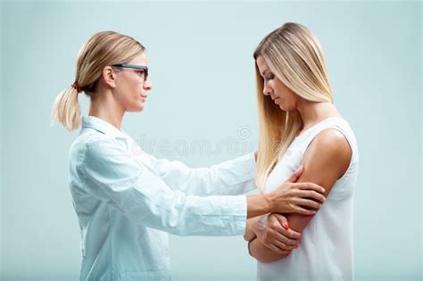 Blonde Doctor Patient Trust Physical And Emotional Care Stock Photo Image Of Illness