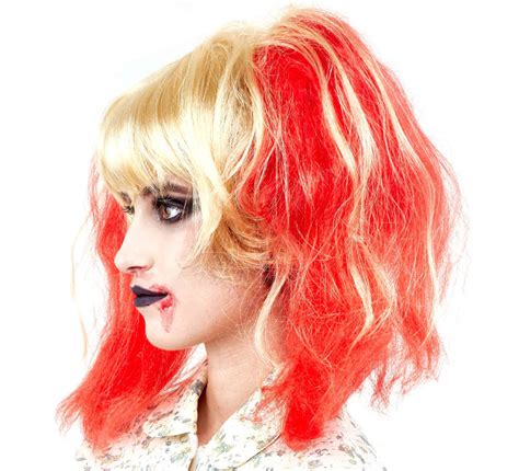 Blonde Zombieperücke mit roten Zöpfen