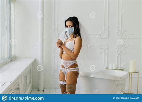 African American Bride In Lingerie Mask And In The Morning Preparing