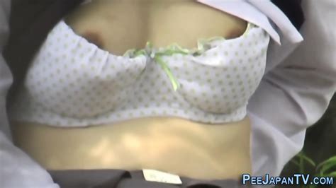 Japanese Babe Rubs Cunt