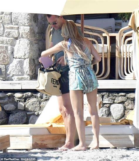 John Terry S Wife Toni Wows In A Skimpy Blue Bikini As She Soaks Up The Sunshine With Her