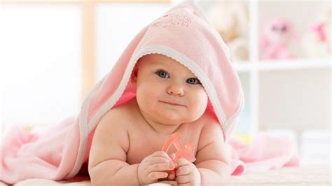 Cute Child Baby Is Lying Down On White Cloth Covered With Towel Hd Cute