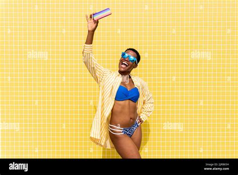 Cheerful Woman In Bikini Taking Selfie Through Smart Phone Stock Photo Alamy