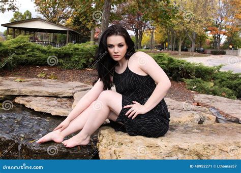 S Caucasian Brunette With Feet In Water Outside Stock Image Image Of Background Waterfall