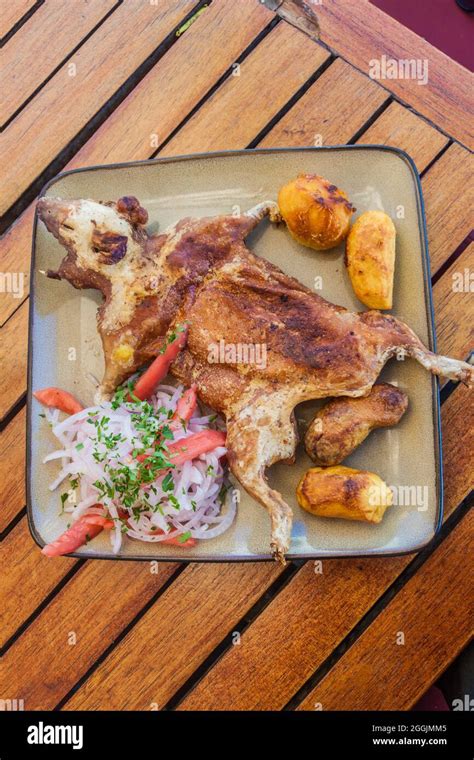 Roasted Guinea Pig Traditional Meal In Peru Stock Photo Alamy