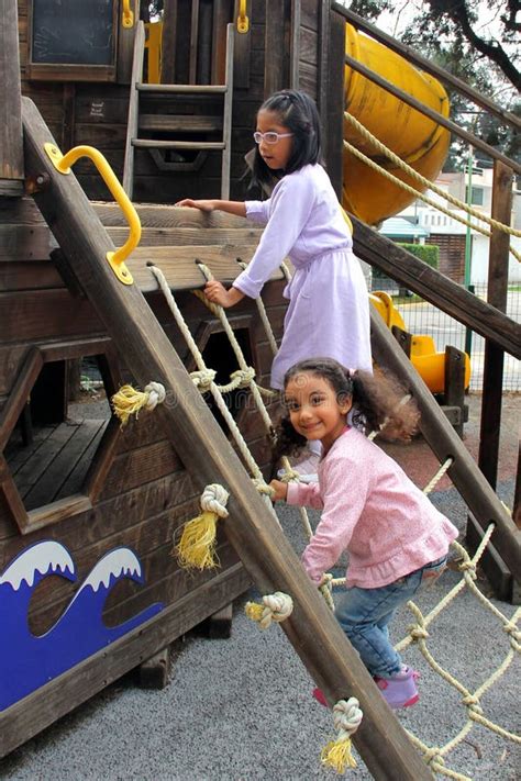 Year Old Brunette Latina Sisters And Friends Play In The Park Games During Their Vacation