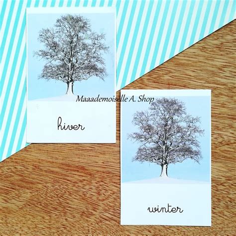 Two Cards With Trees On Them And The Words Winter Written In Cursive