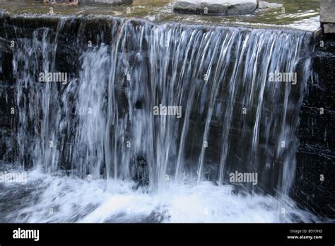 waterfall   mill dam stock photo alamy