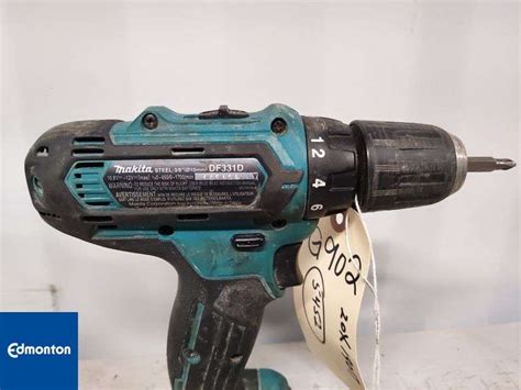 Makita DF331D 12V Drill - Michener Allen Auctioneering Ltd