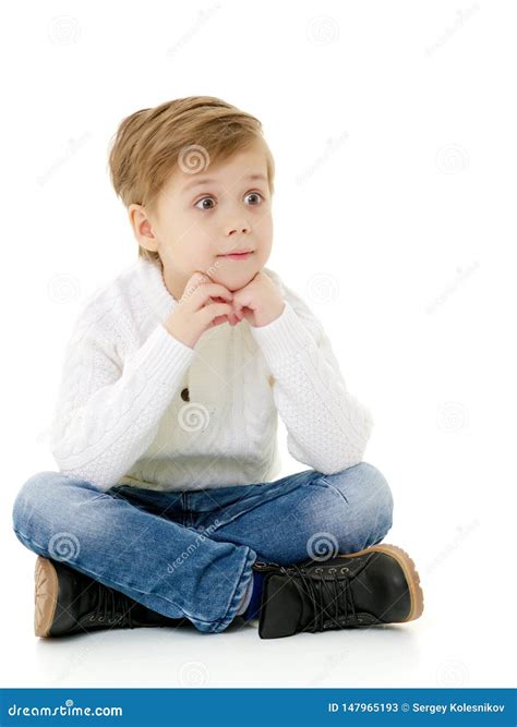Little Boy Is Sitting On The Floor Stock Image Image Of Handsome