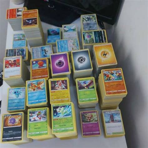 lote de 50 cartas Pokemon originais COPAG Desconto no Preço