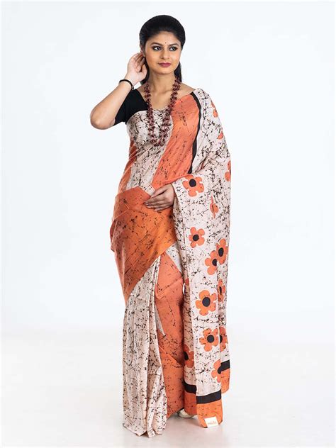 White And Saffron Batik Silk Saree With Floral Patterns Moksha