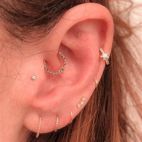 EAR CURATION On Instagram Faux Rook Upper Helix Mid Helix Daith