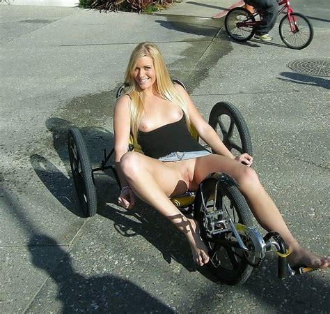 Posing Almost Topless In A Short Skirt And Showing Her Boobs And Bottomless Pussy